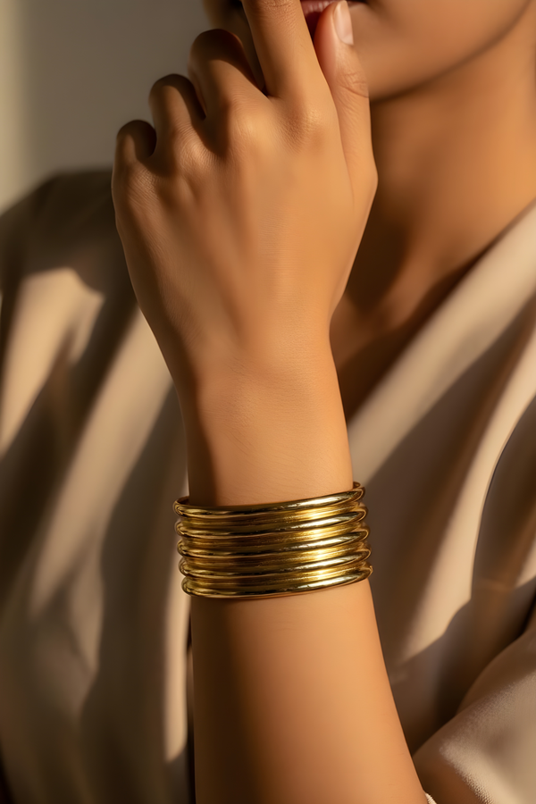 Celestraa Radiant Gold Bracelet with Modern Spiral Detailing